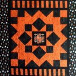 School T-Shirt Quilt - I made this quilt for my oldest granddaughter when she went to the University of Texas.