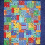 Dinosaur Uproar Baby Quilt