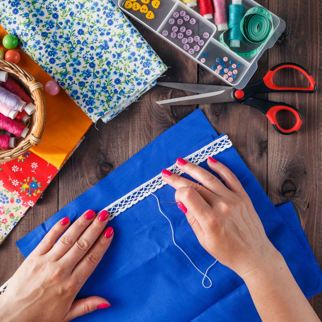 two hands of a person getting ready to start sewing