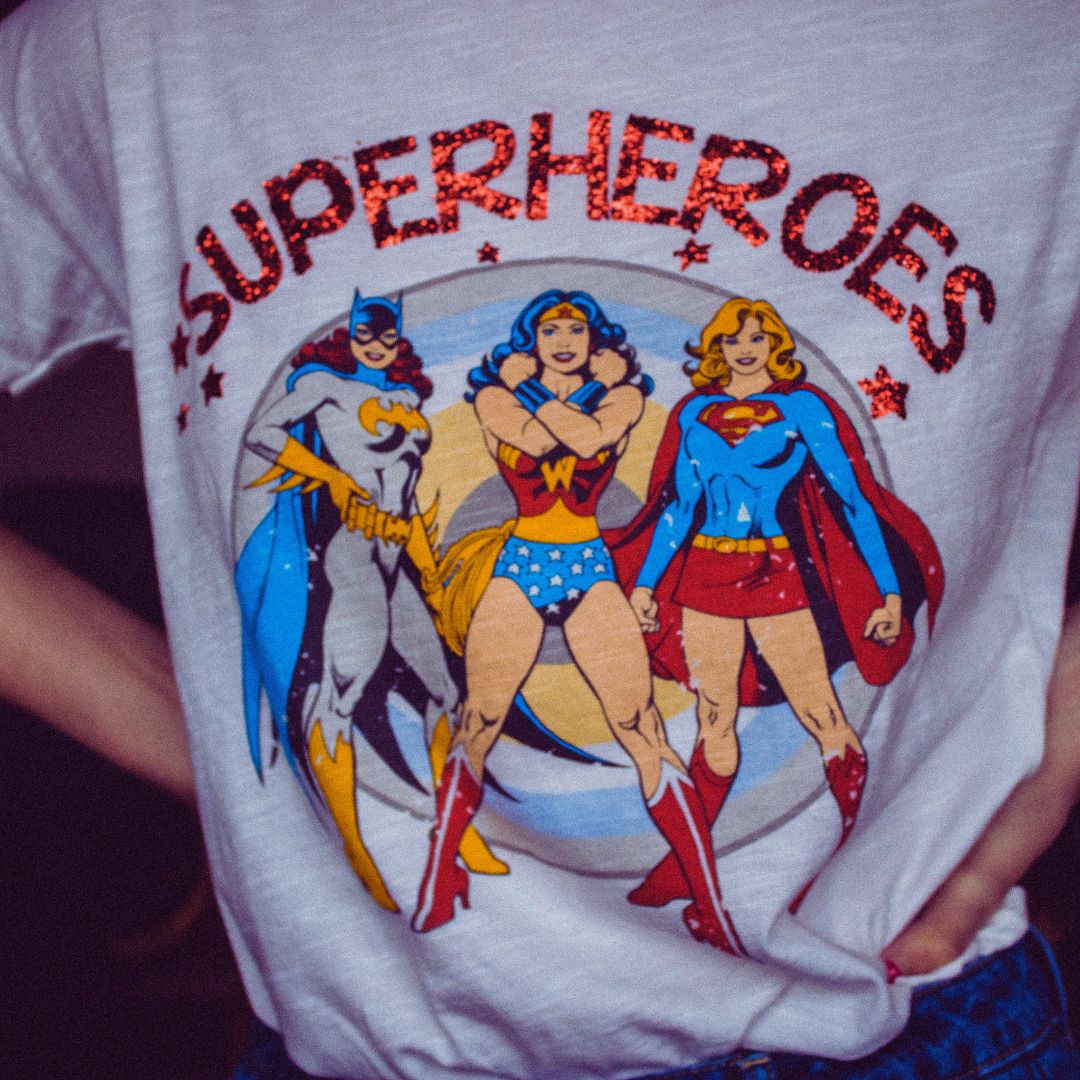 grey tshirt with superheros on it
